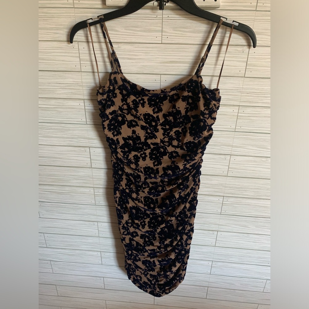 Windsor bodycon cocktail dress with nude background color with navy floral desig